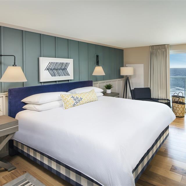 King bed with coastal decor